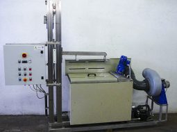 Tank used for the burnishing of brass metal parts